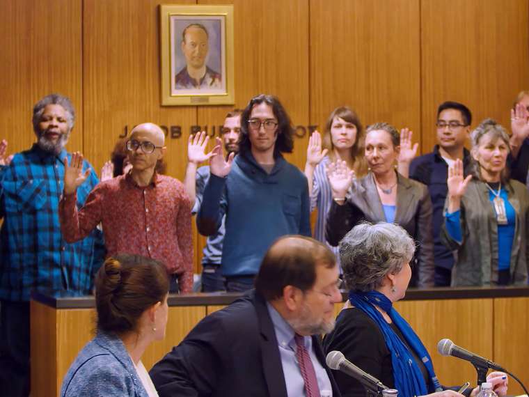 Jury members are sworn in during “I Speak for the Trees: A Mock Trial,” an A Blade of Grass event that tested whether art copyright law could be used to legally halt construction of a natural gas pipeline, as proposed by A Blade of Grass Fellow Aviva Rahmani. Photo courtesy of RAVA Films.