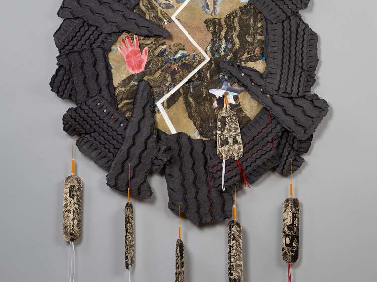 Corwin Clairmont (Salish Kootenai), “Split War Shield,” cast, handmade paper, lithographs, and mixed media, 2001, 83¼ x 50¾ x 3¼ inches. MAM Contemporary American Indian Art Collection, purchase and partial gift of Corwin Clairmont, 2007.01, copyright the artist, image courtesy of Slikati Photography.