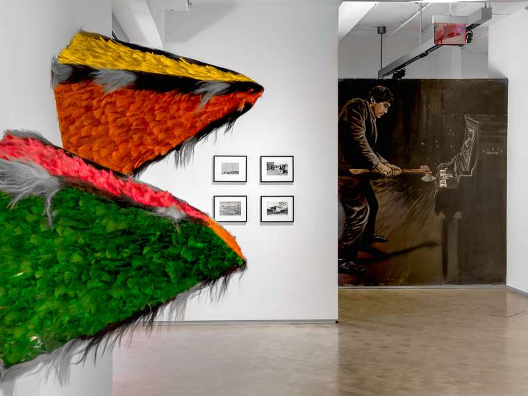 Raphael Montañez Ortiz, Maya Zemi II [left]; Maya Zemi I [right], 1988. Feathers and cardboard. Installed in the exhibition Museum Starter Kit: Open With Care, on view at El Museo del Barrio, New York, March 12 – September 6, 2014. Artwork © Raphael Montañez Ortiz | Image © El Museo del Barrio, New York | Photography: Michael J. Palma.