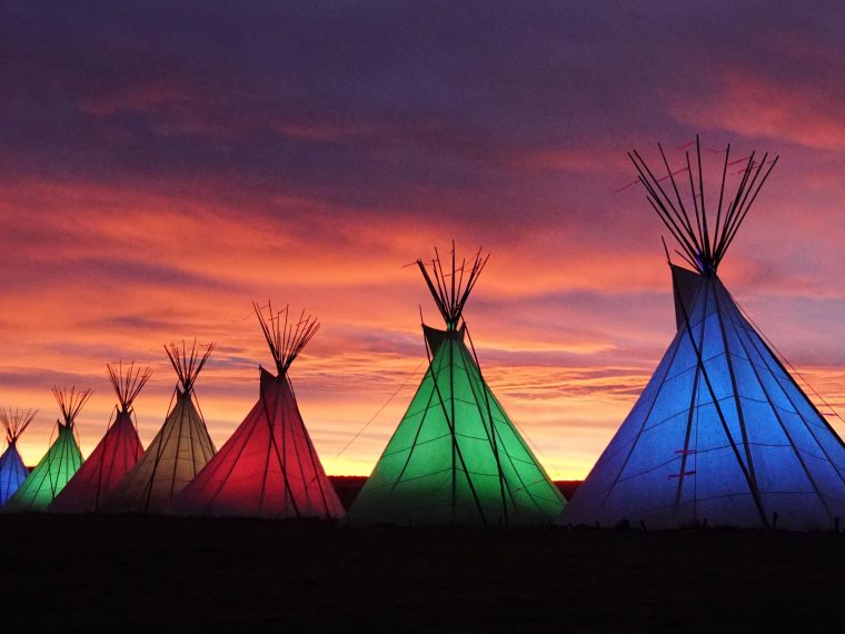 Lighting of the Teepees. Photo by Jade Snell.