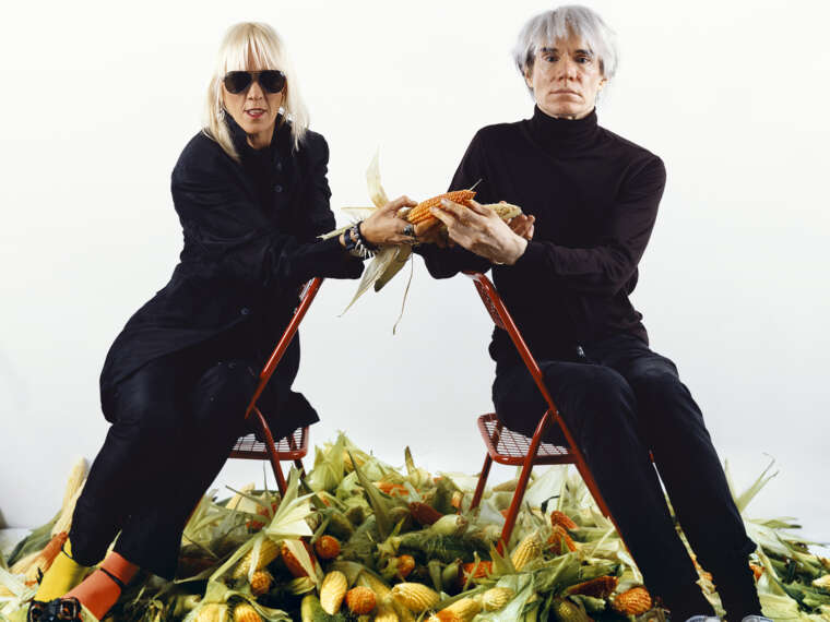 Marta Minujín with Andy Warhol, El pago de la deuda externa argentina con maíz, “el oro latinoamericano” (Paying Off the Argentine Foreign Debt with Corn, “the Latin American Gold”), New York, 1985 / 2011, C-print, 36 3/8 × 39 1/4 in. (92.4 x 99.7 cm). Collection of the artist. © Marta Minujín, courtesy of Henrique Faria, New York and Herlitzka & Co., Buenos Aires.