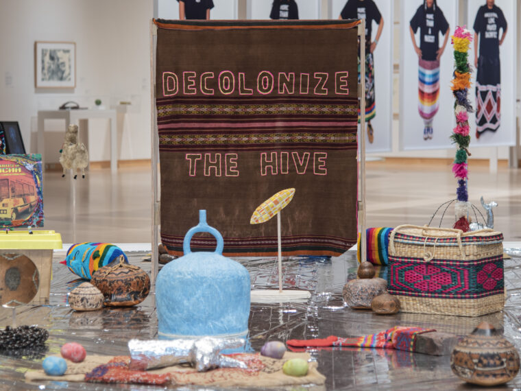 Juan William Chávez, Survival Blanket (Decolonize the Hive), 2023. Mixed-media installation, 15 x 15 ft. Installation view, Sharing the Same Breath, John Michael Kohler Arts Center, Sheboygan, WI, 2023. Photo courtesy of John Michael Kohler Arts Center.