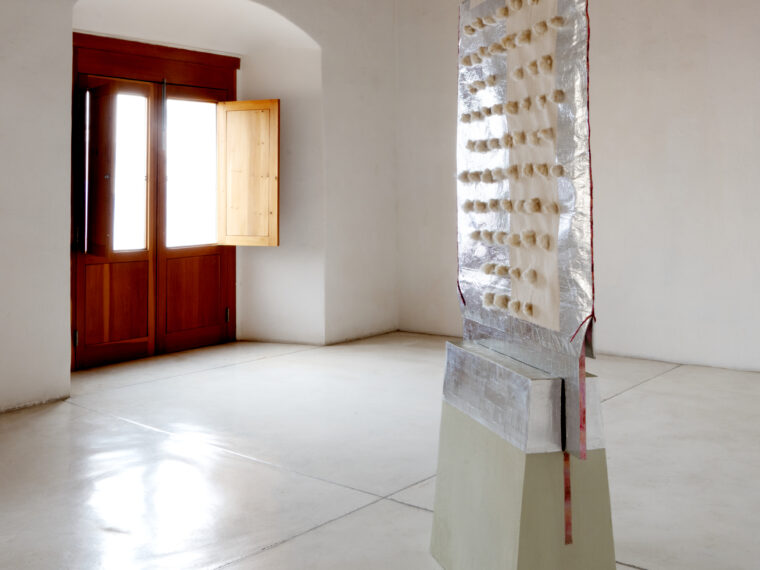 Dianna Frid, Writings on Rhythm, 2024. Wool, canvas, silk thread dyed with cochineal, aluminum foil, pochote fiber, paint mixed with green quarried stone, and colored pencil. 76 x 38 1/4 x 13 1/4 in. 